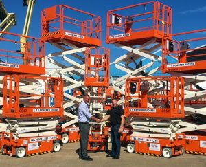 paul-fairhall-left-from-lts-with-snorkel-uks-jim-martyr-handing-over-the-electric-scissor-lifts